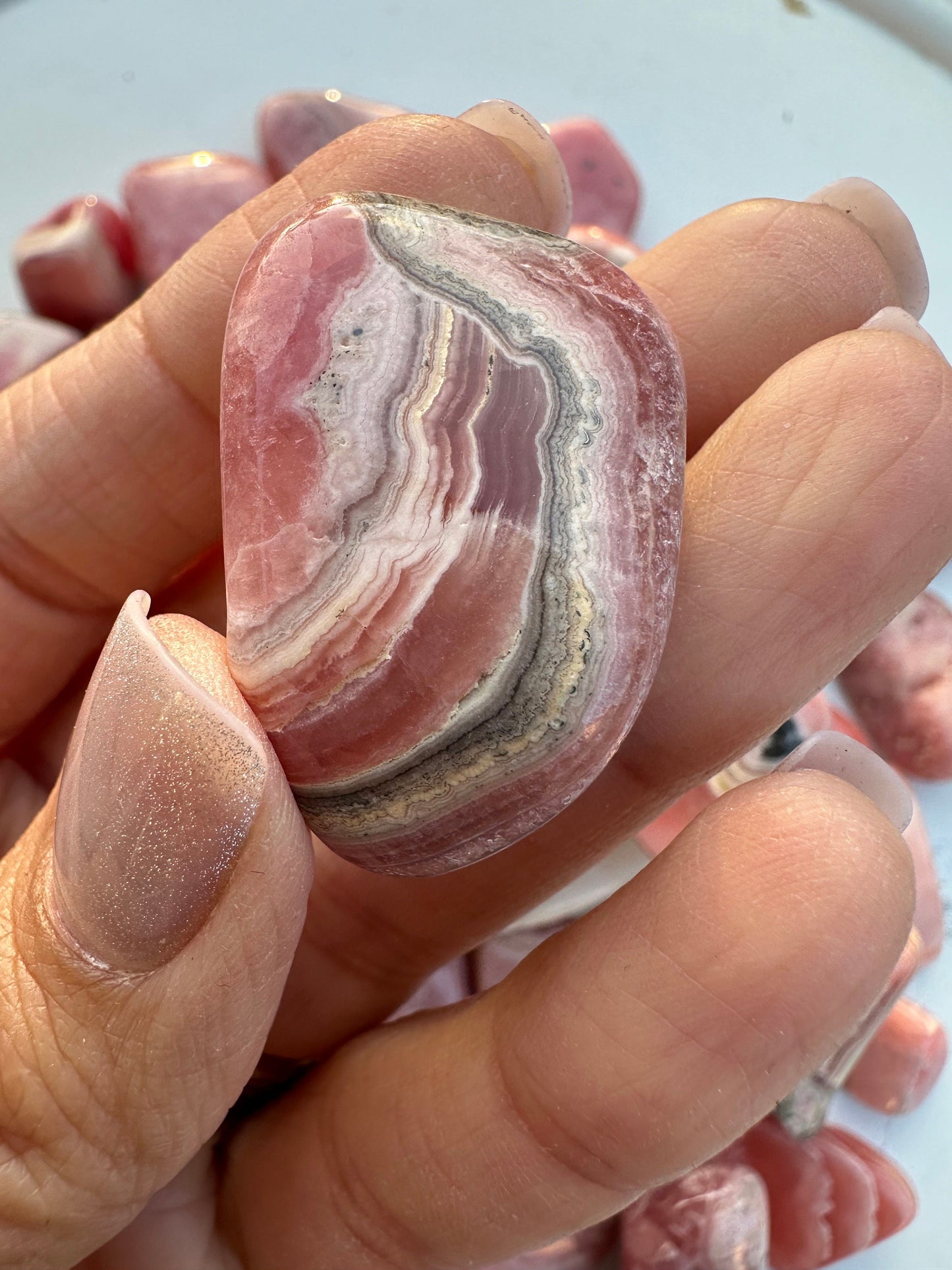 High quality Rhodochrosite Argentina, Saturated Raspberry, Gemmy, tumbled crystal