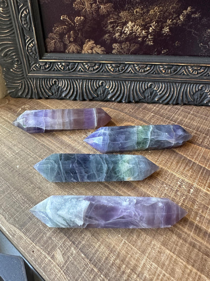 Rainbow fluorite DT point, blue fluorite double point