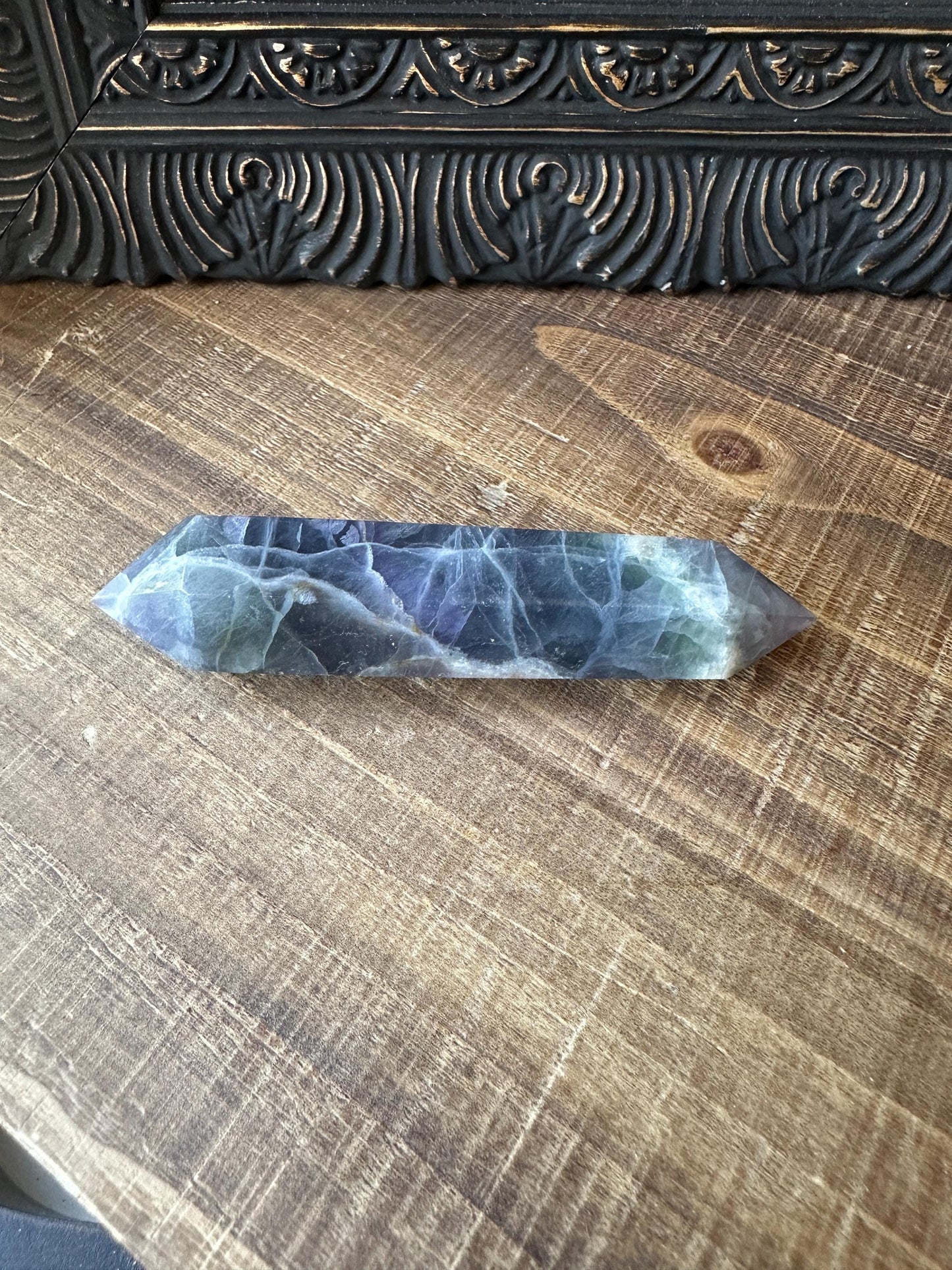 Rainbow fluorite DT point, blue fluorite double point